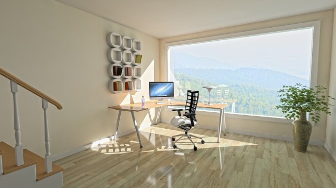 A small but luxurious office space with a wide window